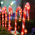 ^ '4 CANDY STAKES' 40 WW LED ΛΑΜΠΑΚΙΑ 8ΠΡΟΓΡΑΜ ΑΝΑΠΤ(4.5V) IP44 M1.5m*Φ2.5cm*Y60cm 0.5m ΠΡΑΣ ΚΑΛ ΤΡ